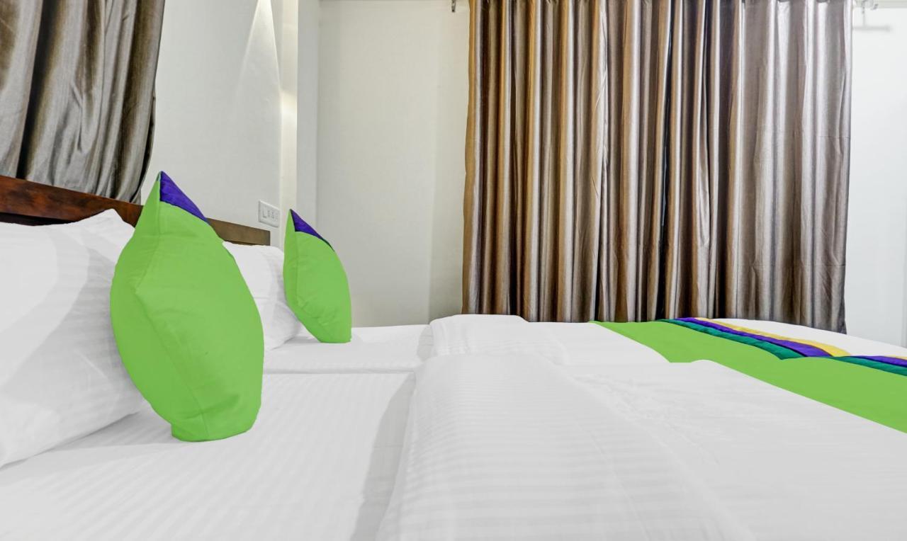 Treebo Tulip Hotel Púna Kültér fotó